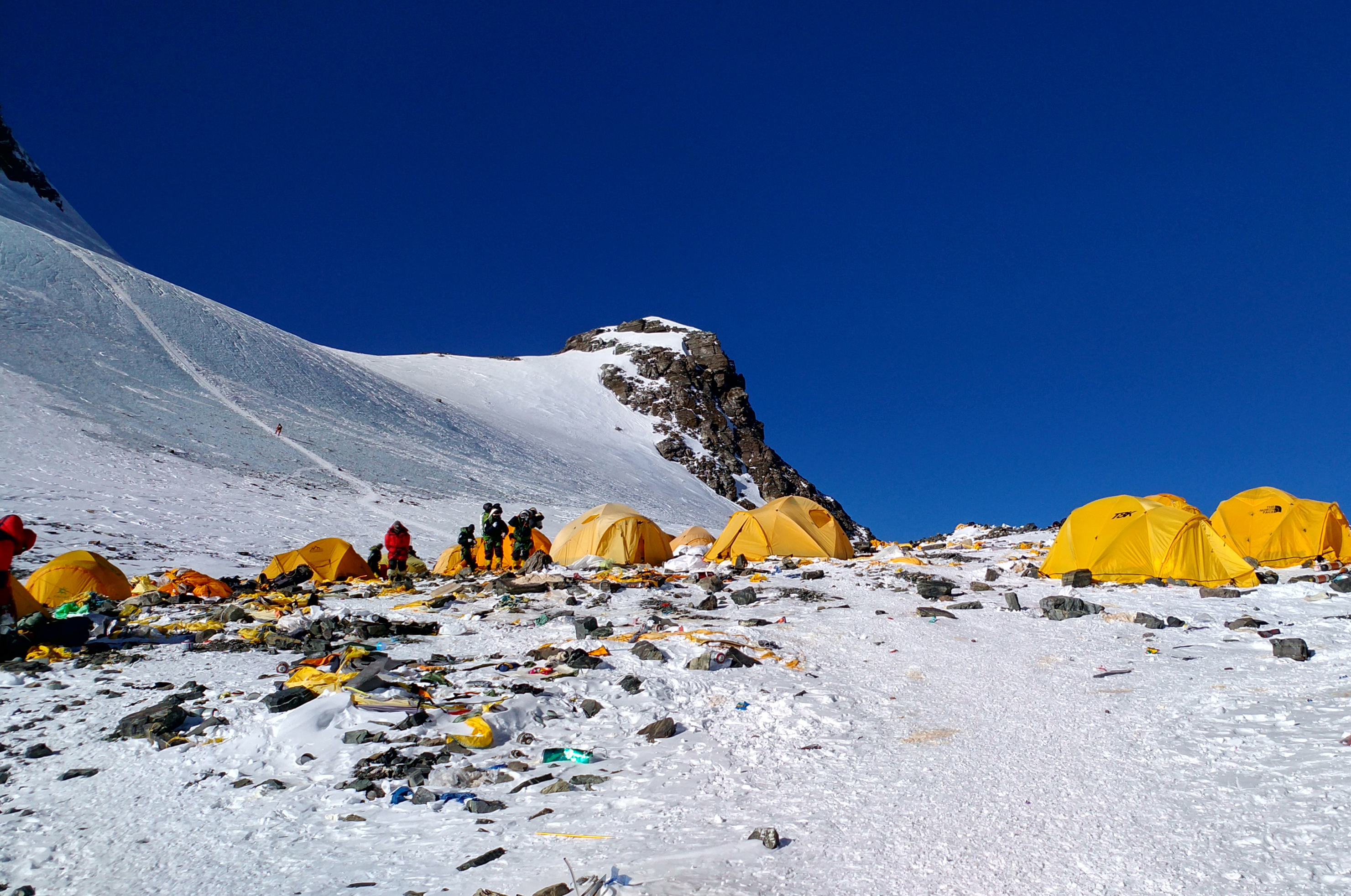 Everest welcomes more and more climbers and is awash in their waste