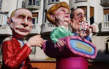 CarnavalNice-Poutine-Hollande-Merkel