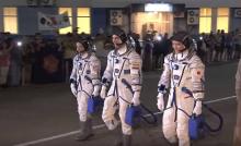 Trois astronautes.