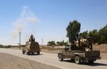 Les forces démocratiques syriennes en direction de Raqa, lors d'une offensive contre les jihadistes 