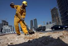 Un ouvrier sur un chantier de construction à Doha le 1er avril 2007. Les ouvriers étrangers au Qatar