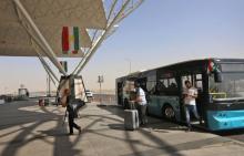 Des passagers arrivent à l'aéroport d'Erbil, le 28 septembre 2017