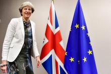 La Première ministre britannique Theresa May s'entretient avec le président de la Commission europée
