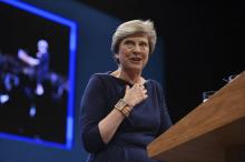 La Première ministre britannique Theresa May lors de sa conférence de presse à Manchester, le 4 octo