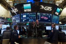 Traders sur le parquet du New York Stock Exchange le 11 octobre 2017