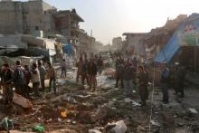 Photo d'un marché de la ville d'Atareb après des raids aériens contre ce bastion rebelle, le 13 nove