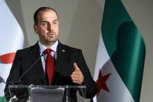 Le chef de la délégation de l'opposition syrienne, Nasr Hariri, lors d'une conférence de presse à Ge