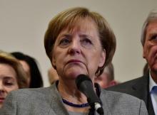 Angela Merkel arrive à des pourparlers sur la formation d'un gouvernement de coalition le 19 novembr