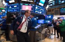 Traders sur le parquet du New York Stock Exchange le 1er novembre 2017 à New York