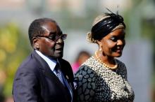 Le président zimbabwéen Robert Mugabe et son épouse Grace à Pretoria en Afrique du Sud, le 24 mai 20