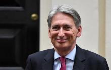 Le ministre des Finances Philippe Hammond quitte le 11 Downing Street, à Londres Le 9 octobre 2017