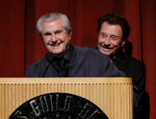 Le réalisateur Claude Lelouch et Johnny Hallyday au Festival du film français COLCOA à Hollywood le 