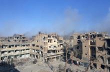Des immeubles détruits dans la ville de Deir Ezzor lors d'opérations des forces gouvernementales syr