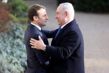 Le président français Emmanuel Macron (g) et le Premier ministre israélien Benjamin Netanyahu, le 10