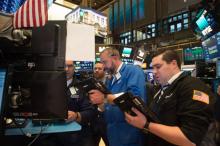 Traders sur le parquet du New York Stock le 11 janvier 2018