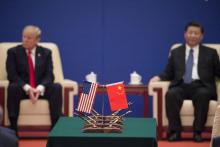 Le président américain Donald Trump et son homologue chinois Xi Jinping, lors d'une recontre avec des dirigeants d'entreprises à Pékin, le 9 novembre 2017
