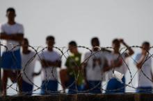 Des prisonniers du pénitentiaire d'Alcacuz, lors d'une mutinerie, le 20 janvier 2017 à Rio Grande do Norte, au Brésil
