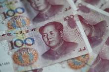 La plateforme qbao.com, ou "trésor d'argent en ligne", a attiré des centaines de milliers d'investisseurs avant de s'effondrer brutalement avec quelque 30 milliards de yuans (3,82 milliards d'euros) e