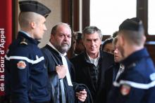 Jérôme Cahuzac (D), au côté de son avocat Eric Dupond-Moretti, à la cour d'appel de Paris, le 12 février 2018