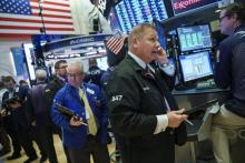 Traders sur le parquet du New York Stock Exchange le 12 février 2018