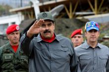 Le président vénézuélien Nicolas Maduro arrive à Fort Tiuna pour assister à des exercices militaires, le 24 février 2018 à Caracas