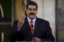 Le président vénézuélien Nicolas Maduro lors d'une conférence de presse, au palais présidentiel, le 15 février 2018 à Caracas