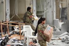 Des rebelles syriens alliés à la Turquie se livrent à des pillages dans la ville kurde d'Afrine, dans le nord-ouest de la Syrie, après avoir pris le contrôle de la cité