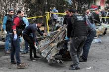 Dispositif de sécurité autour du lieu d'un attenant à la bombe qui a tué un policier dans la ville d'Alexandrie au nord de l'Egypte le 24 mars 2018
