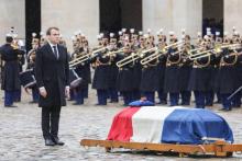 La garde républicaine escorte le cercueil du lieutenant-colonel Arnaud Beltrame à son arrivée à Paris, le 27 mars 2018