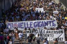 Marche à Rio de Janeiro dans la favela où était née Marielle Franco, une conseillère municipale assassinée, pour demander justice pour cette militante engagée contre le racisme et la violence policièr