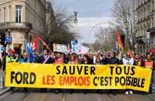 Des salariés de l'usine Ford de Blanquefort en Gironde maanifestent à Bordeaux avant une réunion sur l'avenir du site, le 9 mars 2018