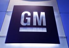 Logo General Motors lors d'une conférence de presse, le 5 juin 2014 à Warren, Michigan