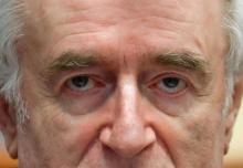 L'ex-chef politique des Serbes de Bosnie, Radovan Karadzic, durant son procès devant le Mécanisme pour les tribunaux spéciaux internationaux à La Haye, le 24 avril 2018