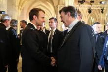 Emmanuel Macron et l'archevêque de Paris Michel Aupetit au Collège des Bernardins à Paris, le 9 avril 2018