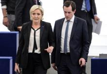 La présidente du Front national, Marine Le Pen, et le secrétaire général du parti, Nicolas Bay, tous