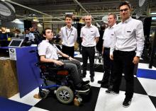 College students and their teachers pose next to the prototype of their invention "Gestual Move", a system of manual control of wheelchair for tetraplegic people, during the 2018 Concours Lepine (Lepi