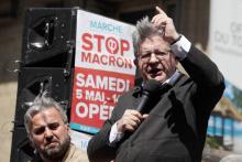 Le député LFI Jean-Luc Mélenchon au départ de la manifestation "La fête à Macron" le 5 mai 2017 à Paris, au côté d'Alexis Corbière