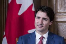 Le Premier ministre canadien Justin Trudeau répond aux questions de journalistes de l'AFP à Ottawa, le 9 mai 2018.