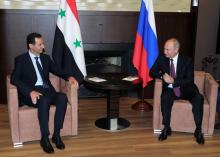 Le président russe Vladimir Poutine et son homologue syrien Bachar al-Assad lors de leur entrevue à Sotchi, dans le sud de la Russie, le 17 mai 2018