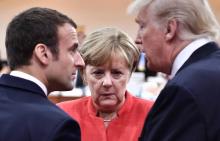 Emmanuel Macron, Angela Merkel et Donald Trump, au sommet du G20 à Hambourg en juillet 2017