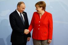 Angela Merkel et Vladimir Poutine lors d'un sommet du G20 à Hambourg, le 7 juillet 2017
