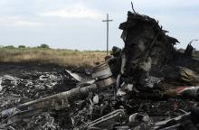 Des débris de la carlingue du vol MH17 de la Malaysian Airlines abattu au-dessus de l'Ukraine, le 18 juillet 2014 près de Shaktarsk