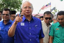 Le Premier ministre malaisien Najib Razak (c), chef de la coalition du Barisan Nasional, lors d'un meeting de campagne, le 8 mai 2018 à Kuala Lumpur à la veille des élections législatives