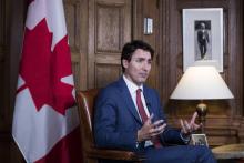 Le Premier ministre canadien Justin Trudeau répond à des journalistes de l'AFP le 9 mai 2018.