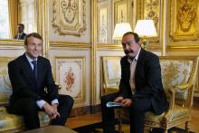Le président Emmanuel Macron et le secrétaire général de la CGT Philippe Martinez lors d'un entretien à l'Elysée le 12 octobre 2017 à Paris
