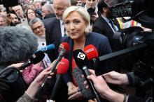 President Marine Le Pen lors d'une manifestation du FN, le 20 avril 2018 à Paris