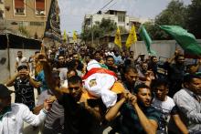 Funérailles d'une jeune Palestinien décédé des suites de ses blessures après des affrontements avec l'armée israélienne, le 25 mai 2018 à Gaza