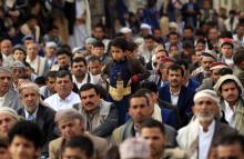 Des habitants de la capitale Sanaa assistent à la prière de l'Aïd el-Fitr, le 15 juin 2018