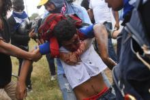 Un manifestant nicaraguayen défilant contre le gouvernement de Daniel Ortega blessé lors d'affrontements à Managua, le 30 juin 2018.