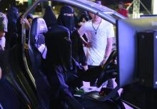 Une femme saoudienne dans un simulateur de conduite, le 21 juin 2018 à Riyad